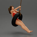Sexy Girl in onepiece Enjoying a Fun Swinging Adventure on Tire - Only-Games