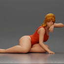 attractive woman in red swimsuit resting calmly on the beach - Only-Games