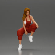 Street dancer in red overalls sitting stylishly on parked car - Only-Games
