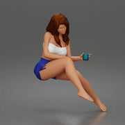 Relaxed woman sips morning coffee wearing summer top and shorts 1-24 - Only-Games