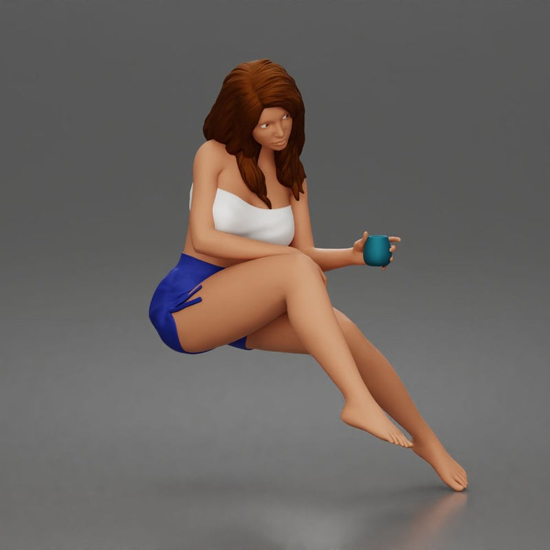 Relaxed woman sips morning coffee wearing summer top and shorts 1-24 - Only-Games