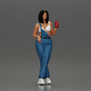 Woman with black hair wearing blue overalls holding a drink - Only-Games