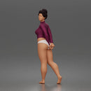 Standing woman looks back long sleeve top underwear bare feet