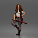 Woman Holding Bat Wearing Vest Pants Boots Confident Standing Pose