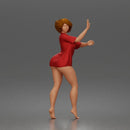 Woman in short dress barefoot expressing joy and freedom