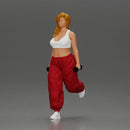 Strong woman power walking with dumbbells wearing white top and red pants - Only-Games