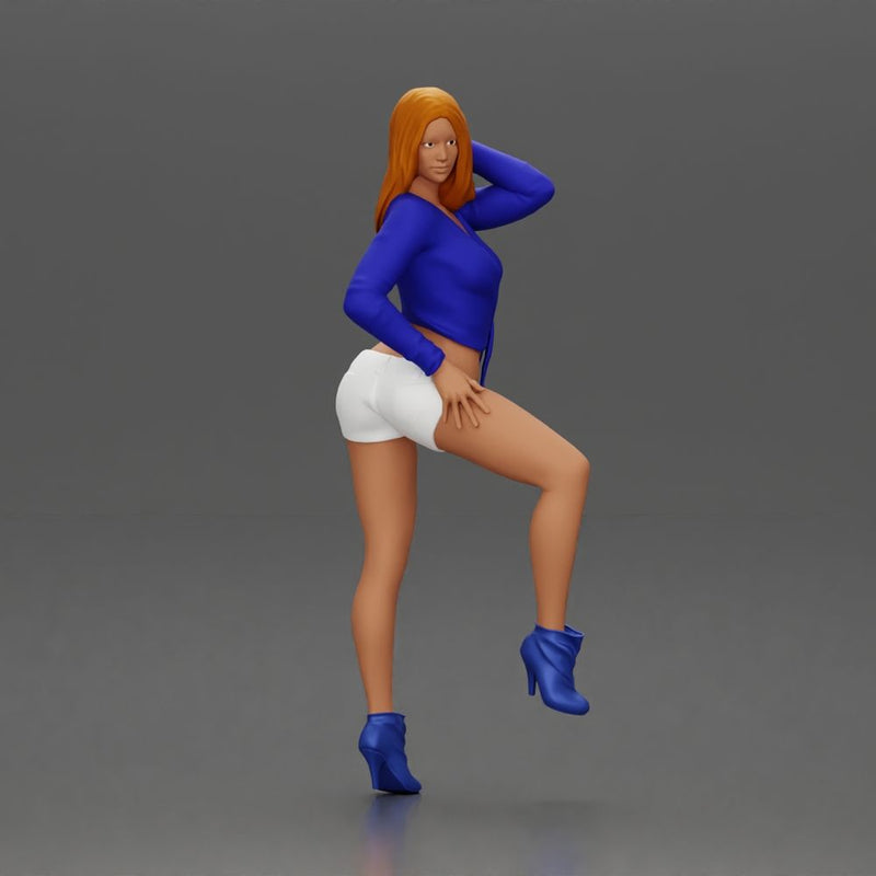 Woman in blue top and white shorts posing on a motorbike - Only-Games