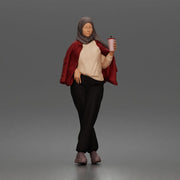 hijabi woman sipping takeaway drink in modern casual streetwear style - Only-Games
