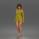 Standing woman In Oversized Button-Shirt With Bucket Hat Barefoot
