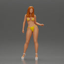 Sexy girl in bikini and heels posing on the beach - Only-Games