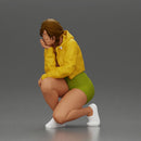 Performer crouching thoughtfully in yellow jacket green shorts white sneakers - Only-Games