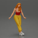 Woman sitting on car in red top yellow pants striking playful pose - Only-Games