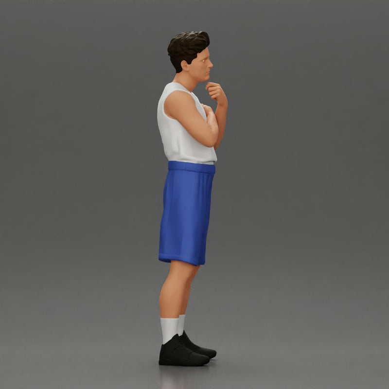 Thoughtful man stands in athletic gear pondering ideas with calm steady focus - Only-Games