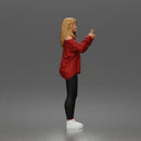 woman pointing upward wearing off shoulder shirt leggings sneakers