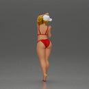 Stylish woman confidently posing in red bikini and white cap - Only-Games