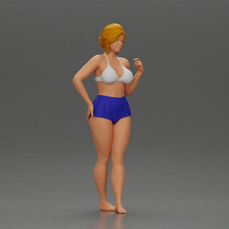 woman posing barefoot wearing bikini top and shorts stylishly - Only-Games