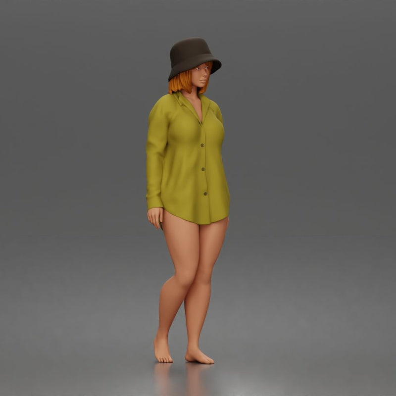 Standing woman In Oversized Button-Shirt With Bucket Hat Barefoot