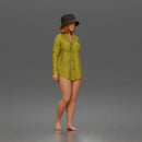 Standing woman In Oversized Button-Shirt With Bucket Hat Barefoot