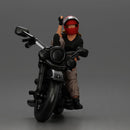Biker woman in red helmet striking pose on black motorcycle - Only-Games