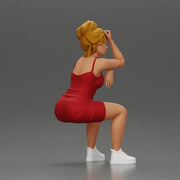 Stylish woman in red dress and sneakers striking dynamic pose - Only-Games