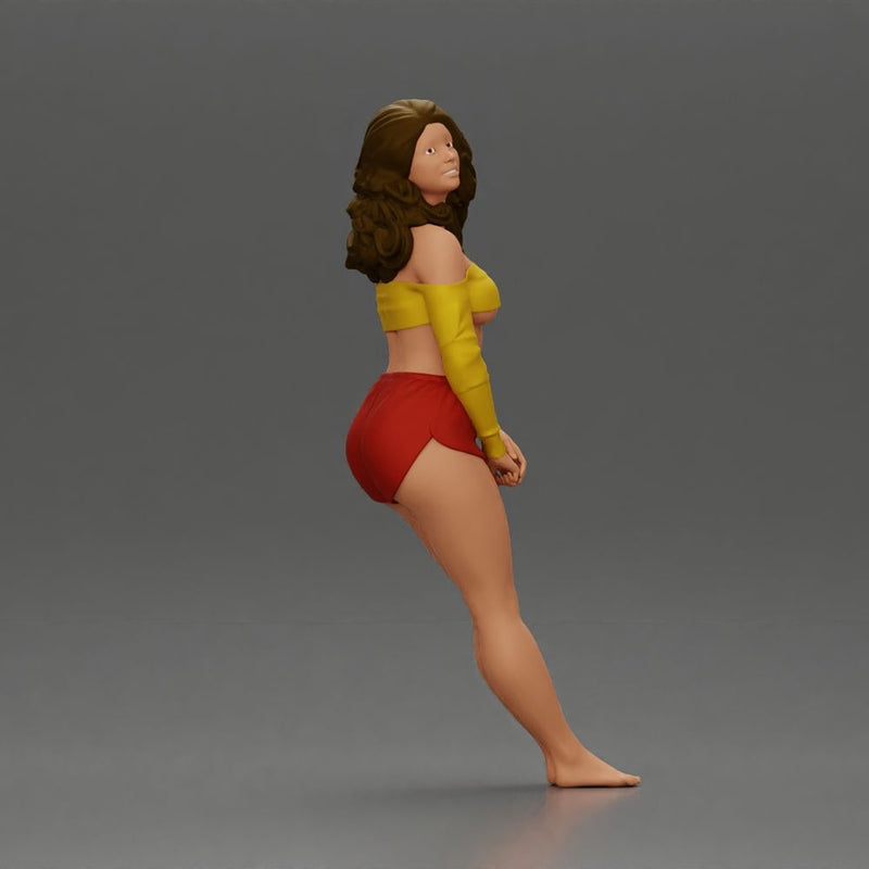 Woman in yellow top and red shorts leaning to wall - Only-Games