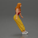 Woman sitting on car in red top yellow pants striking playful pose - Only-Games