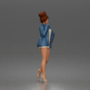Elegant Woman Posing Confidently in Chic Jacket and Dress Outfit