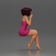 Woman in Pink Dress Sitting with Hands on Chin - Only-Games