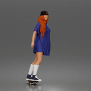 Skateboard girl in long shirt and cap gliding smoothly forward in relaxed street style pose - Only-Games