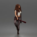 Woman Holding Bat Wearing Vest Pants Boots Confident Standing Pose