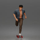 Man Riding Skateboard In Open Short Sleeve Shirt Pants And Sneakers