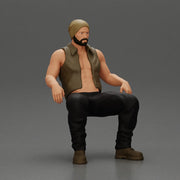 Muscular Bearded Man in Beanie Vest Pants Sitting Casually Relaxed - Only-Games