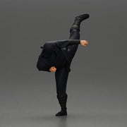 Ninja in black uniform performs high side kick with precision - Only-Games