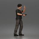 Man Standing With Handgun And Peace Sign In T-Shirt Scarf Cargo Pants And Boots