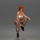Stylish Woman Sitting Confidently in Trendy Tube Top and Pants 1-24