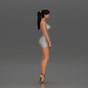 Woman in silver mini dress posing with hand on hip - Only-Games