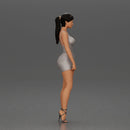 Woman in silver mini dress posing with hand on hip - Only-Games