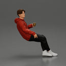 Casually sitting, holding a cup, enjoying a peaceful moment - Only-Games