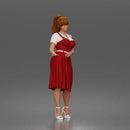 Woman standing In Belted Pinafore Dress Over Blouse With Heeled Sandals