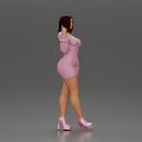 Elegant fashion model in pink mini dress and heels posing - Only-Games