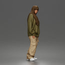 Girl Standing In Oversized Sweatshirt Cargo Pants And Sneakers