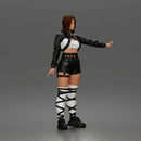 Woman Posing With Arm Extended In Crop Jacket Bralette Leather Shorts And Strappy Boots