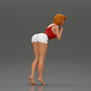 Confident Girl in Red Top and White Shorts, Posing Playfully - Only-Games