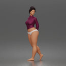 Standing woman looks back long sleeve top underwear bare feet