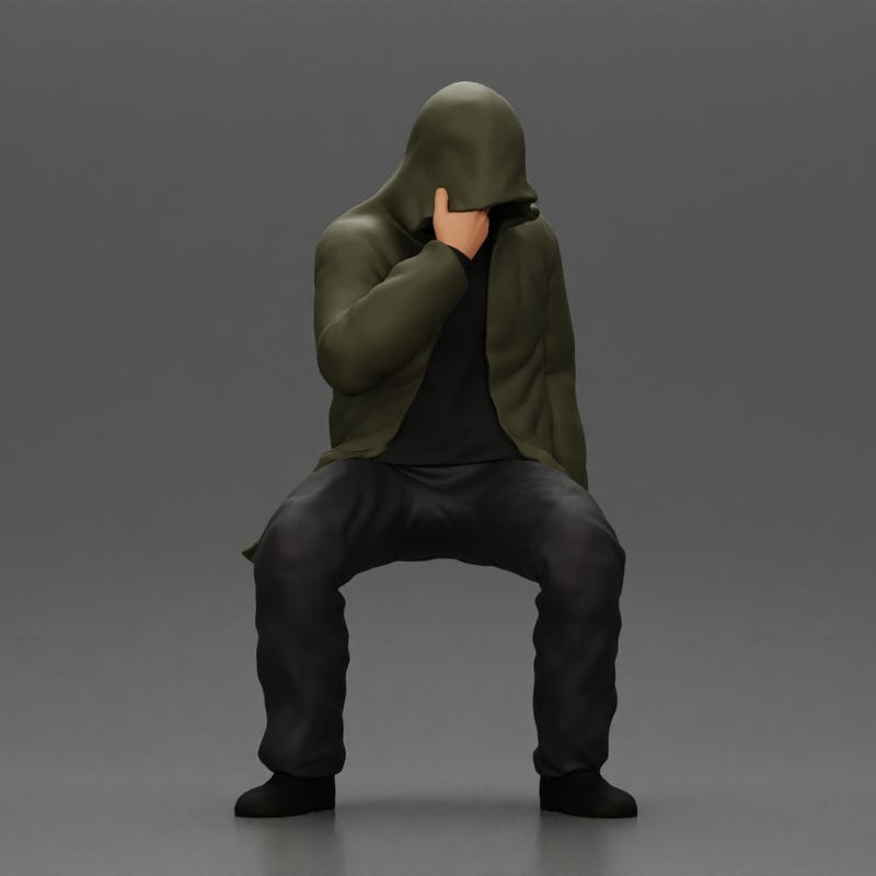 Man in hooded jacket sits alone holding gun feeling troubled - Only-Games