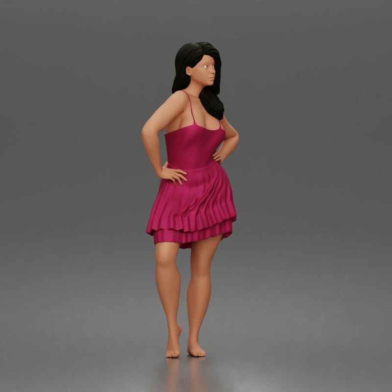 woman posing with hands on hips wearing ruffled dress