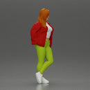 woman standing stylishly hands in pockets striking pose - Only-Games