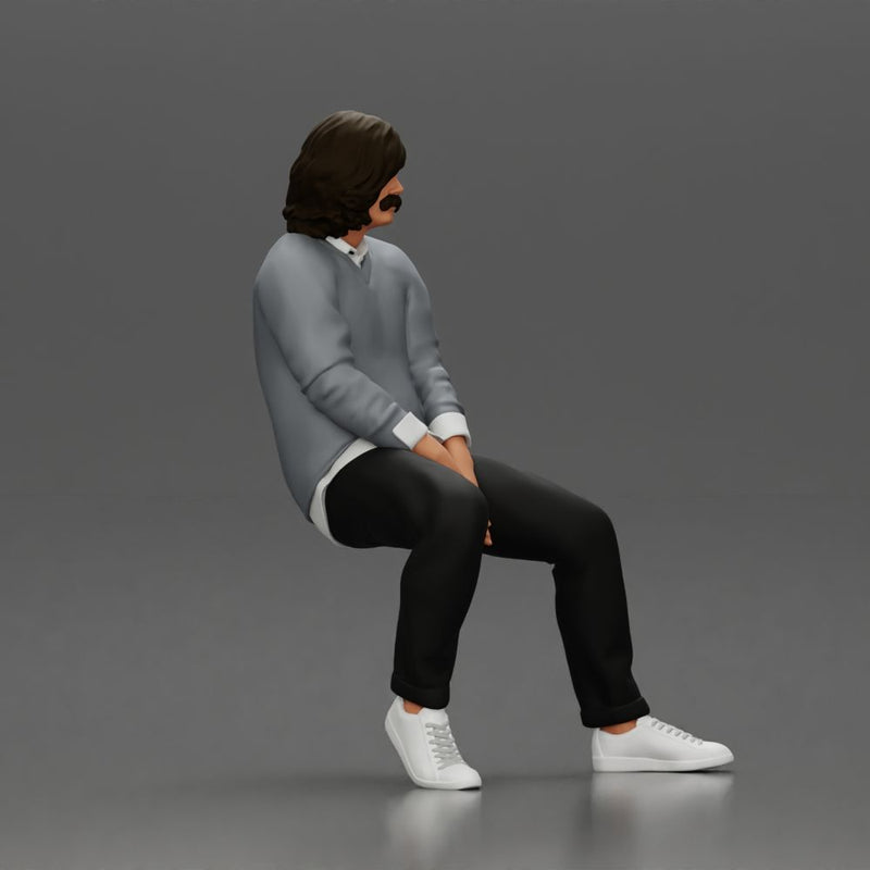 Man in Casual Sweater and Sneakers Sitting with Relaxed Posture - Only-Games