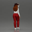 woman in red pants striking stylish pose with hat - Only-Games
