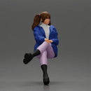 Stylish Woman in Blue Jacket Relaxing with Confident Poise - Only-Games